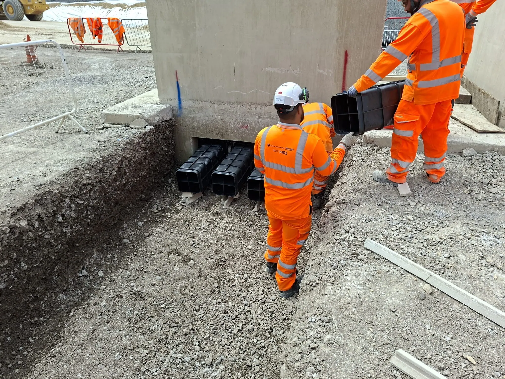 Site operatives installing access chambers at the HS2 Greatworth Green Tunnel